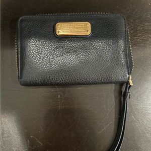 Marc Jacobs wristlet with phone holder.